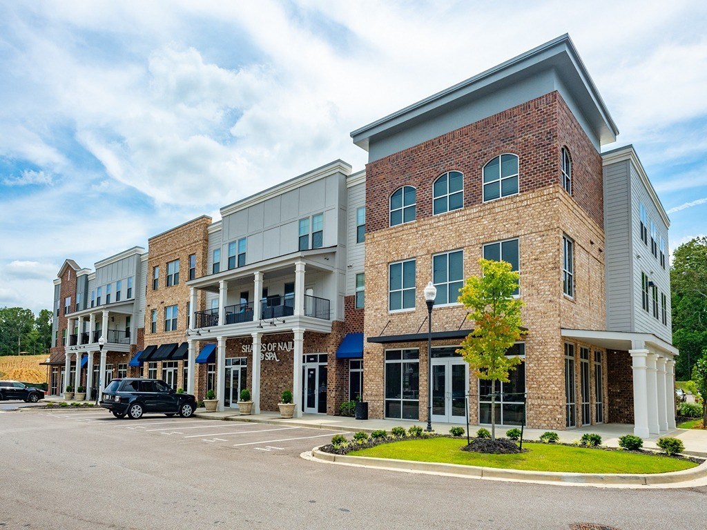 a large building with a street in front of it