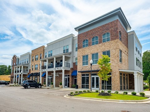 a large building with a street in front of it at Lakeland Town Square, Lakeland
