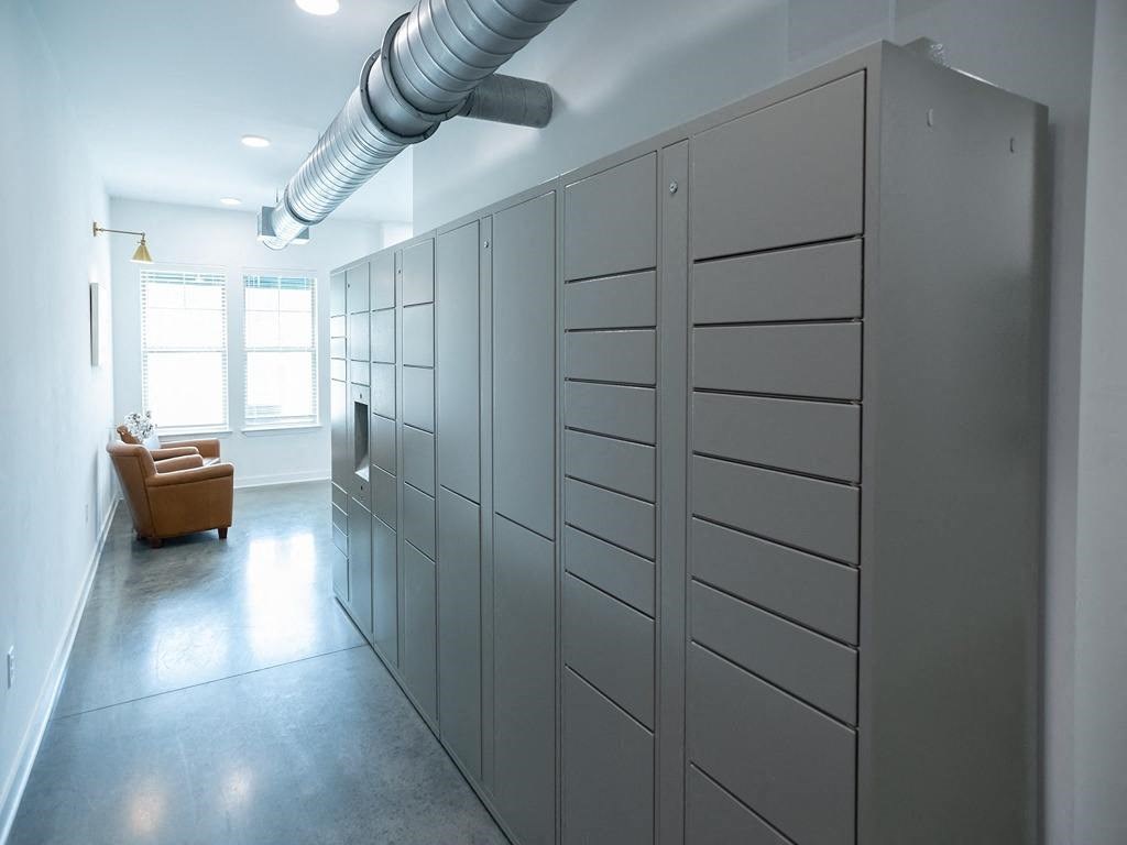 a room with a bunch of lockers and a chair