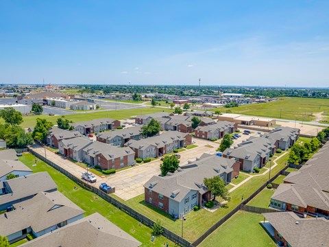 A large housing complex with a mix of detached and semi-detached houses.