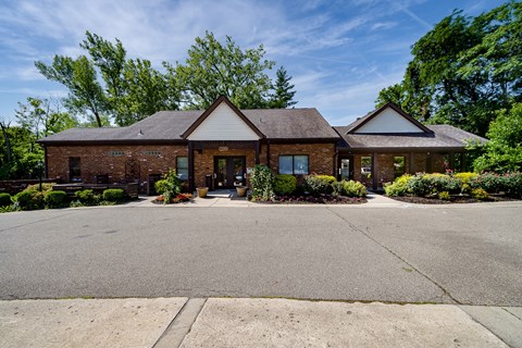 A house with a driveway in front of it.