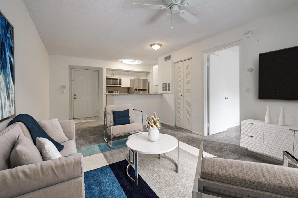 a living room with couches and a table