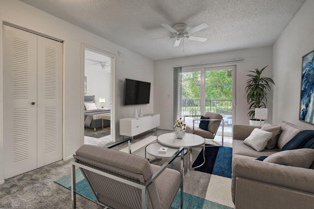 a living room with a couch and a table