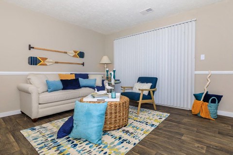 a living room with a couch and a table