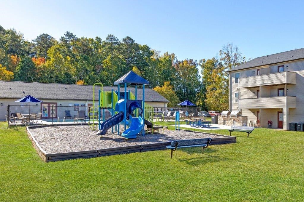 playground next to a grilling area