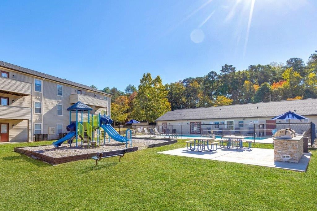 playground next to a grilling area