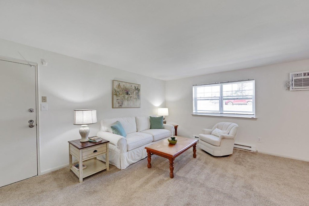 a living room with a couch and a table