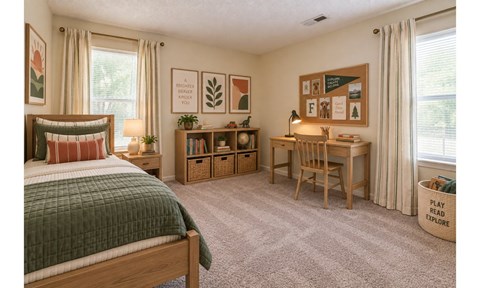 A bedroom with a bed, desk, and chair.
