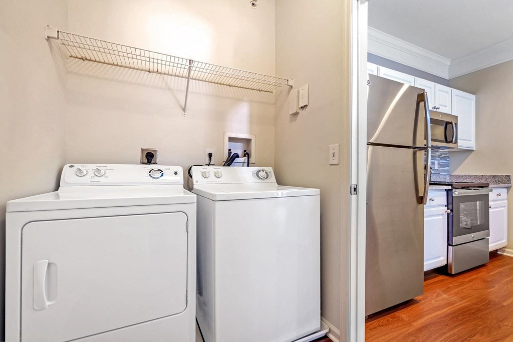A laundry room with a washer and dryer.