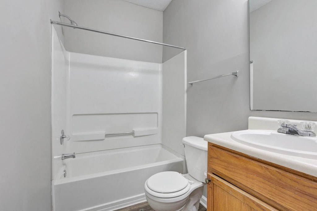 a bathroom with a sink toilet and a shower