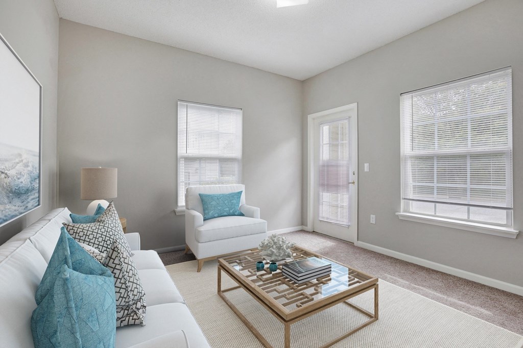 a living room with a couch and a coffee table