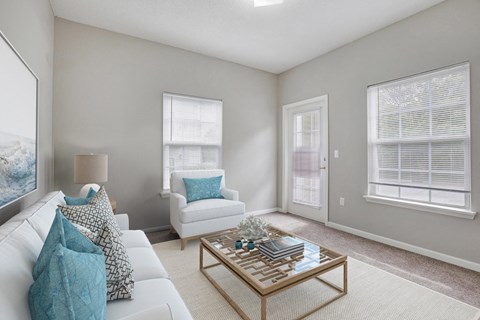 a living room with a couch and a coffee table