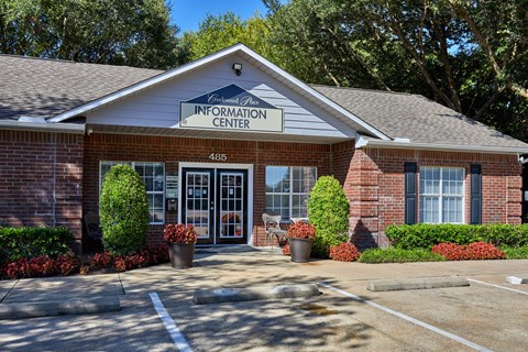 The front of a building with the words "Information Center" on it.