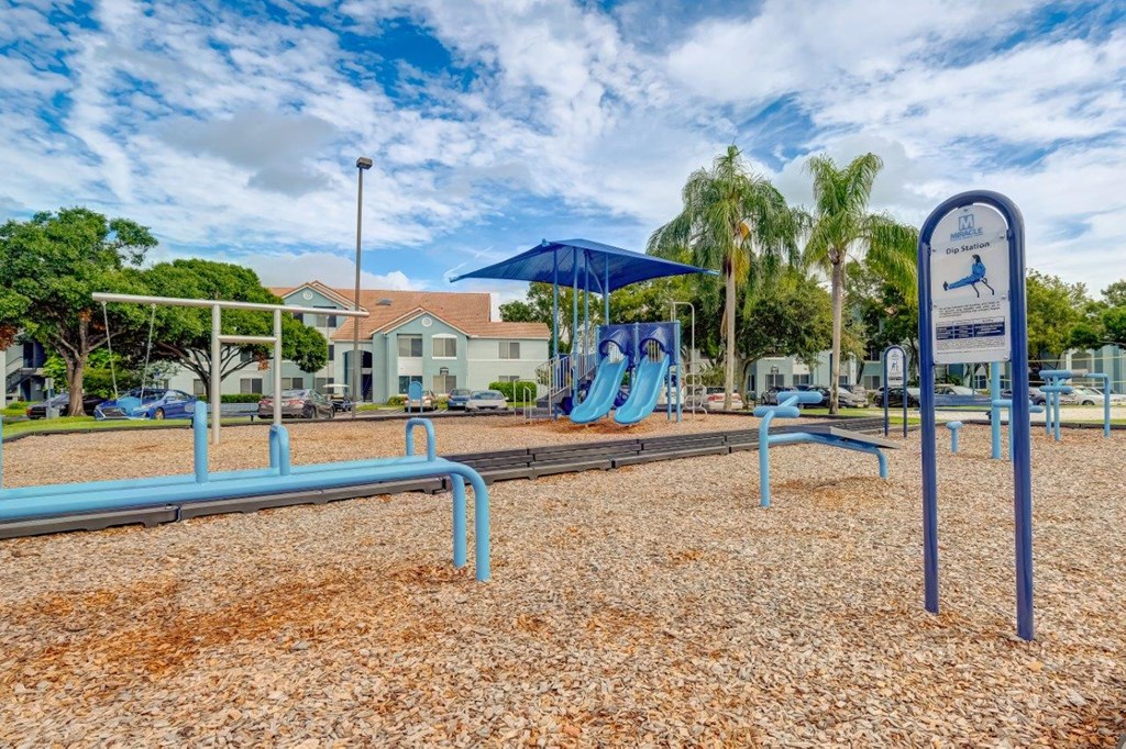 our playground is equipped with a set of slides and swings