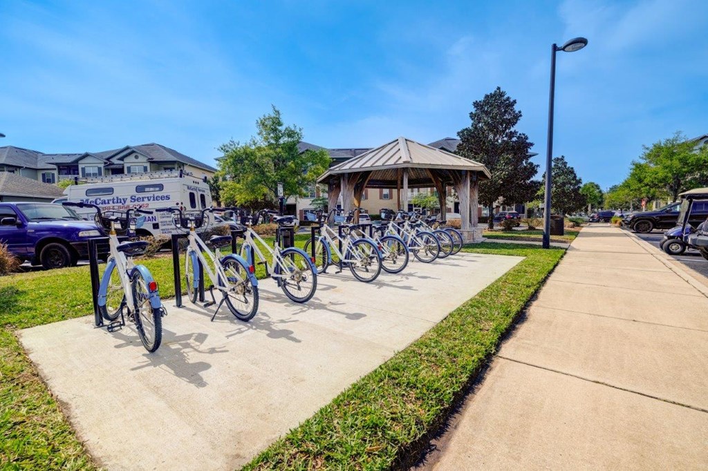 a group of bikes parked in front of a building