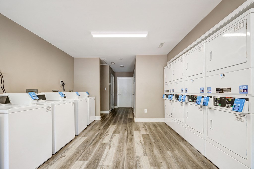 the laundry room is equipped with washes and dryers for residents to use
