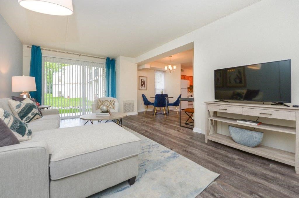 a living room with a couch and a tv