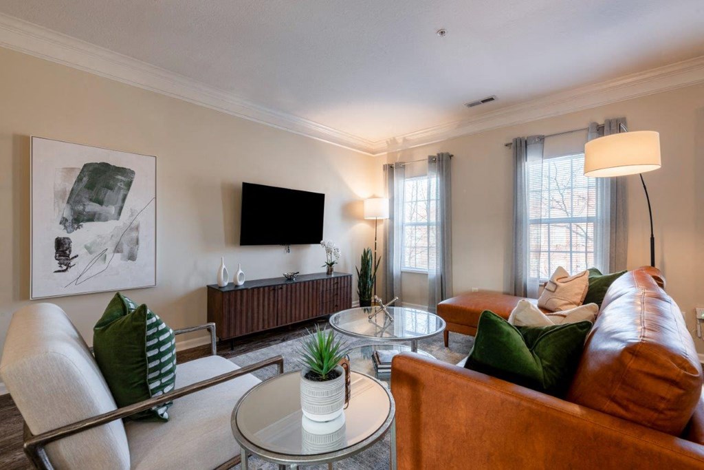 a living room with a couch and a table