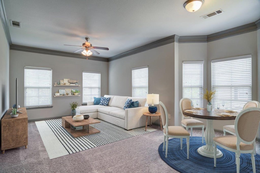 a living room with a couch and a table