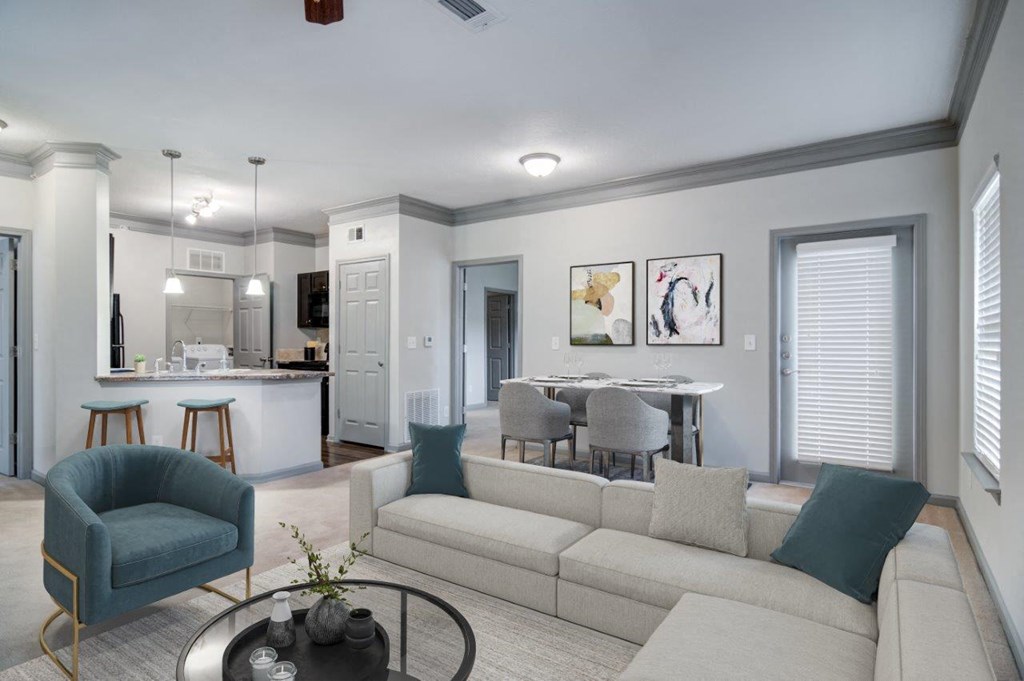 a living room with a couch and a table