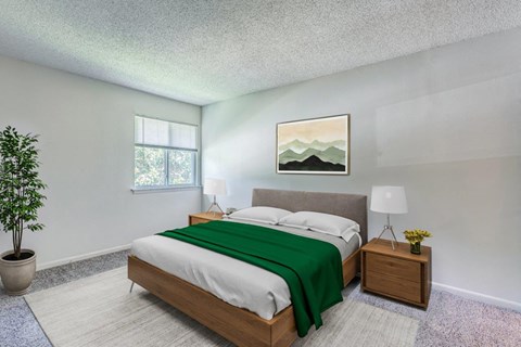 A bedroom with a bed, nightstand, lamp, and a painting on the wall.