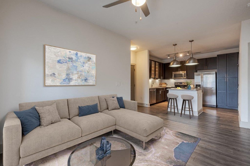a living room with a couch and a table