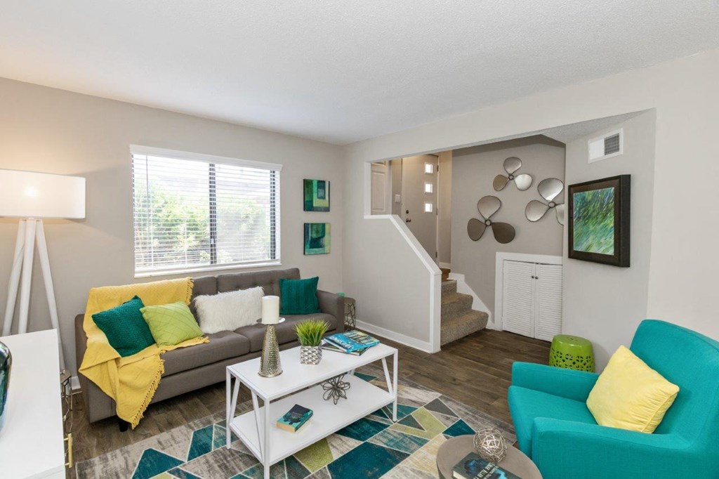 a living room with a couch and a table