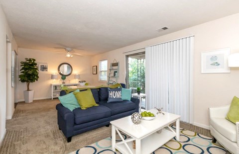 a room with blue and white lights and tables