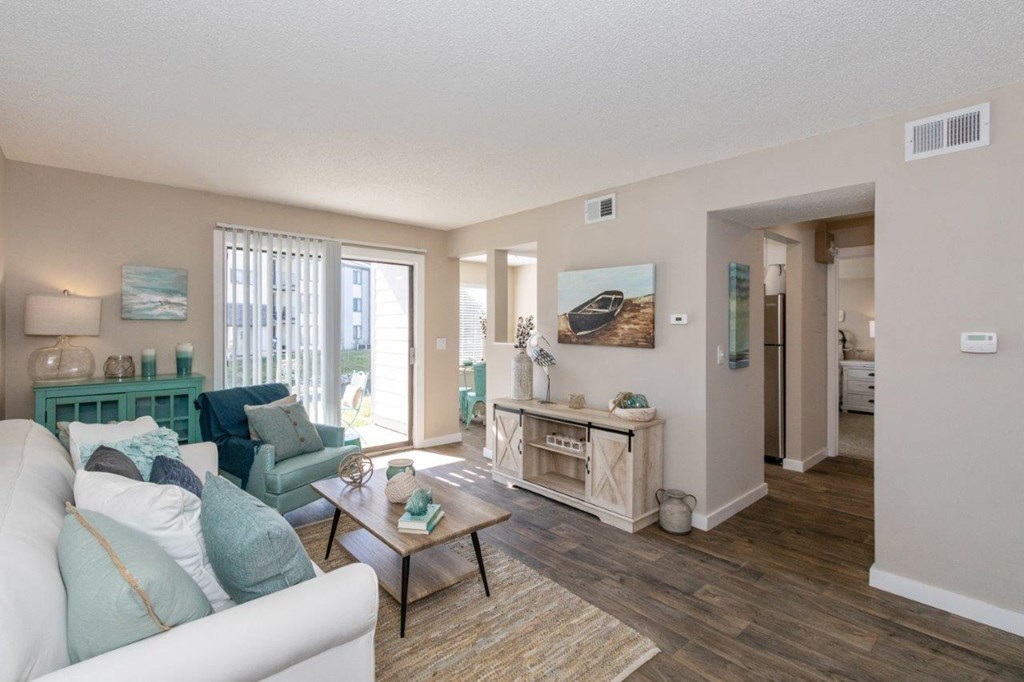 a living room with a couch and a table