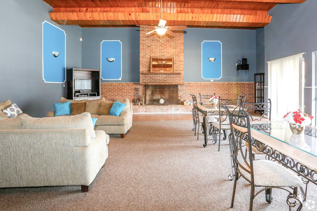 A living room with a fireplace and a couch.