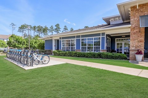 a group of bikes parked in front of a building