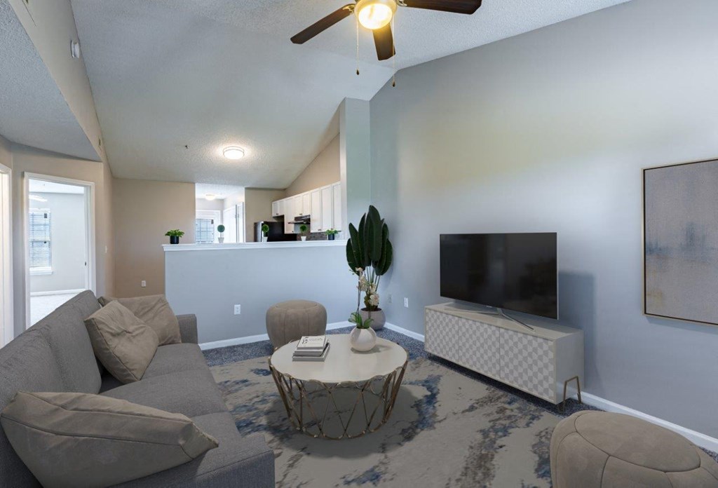 Staged living room with ceiling fan