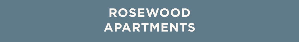 The image displays the text "ROSEWOOD APARTMENTS" in a large, bold font centered on a plain background.