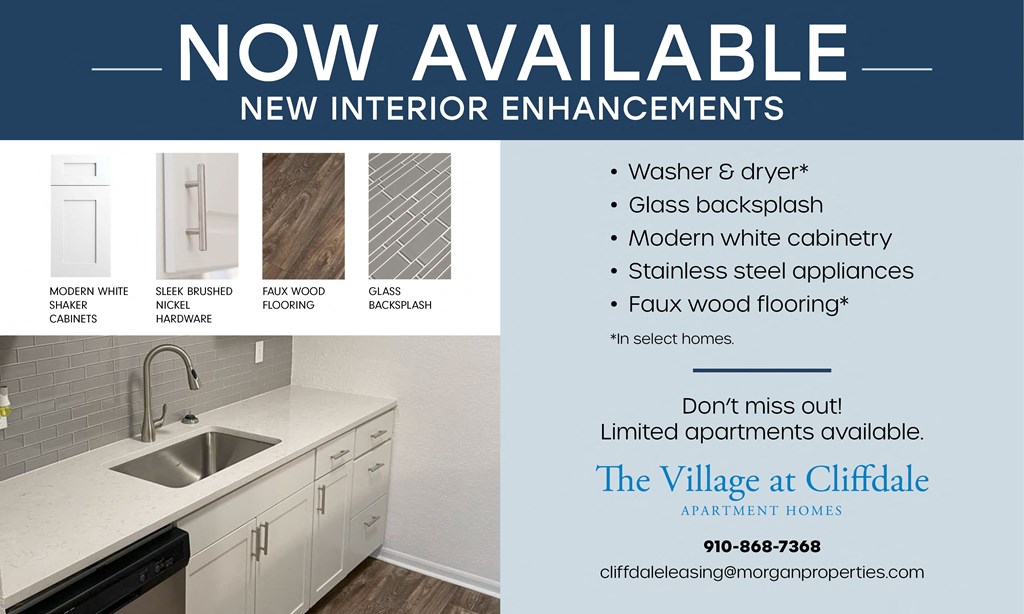 a kitchen with white cabinets and a sink and a faucet