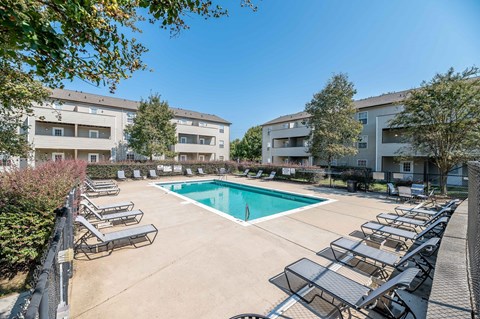 our apartments have a swimming pool with lounge chairs