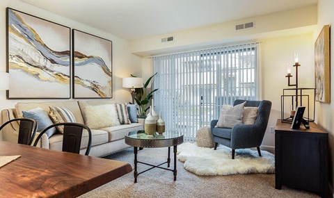 a living room with a couch and a table