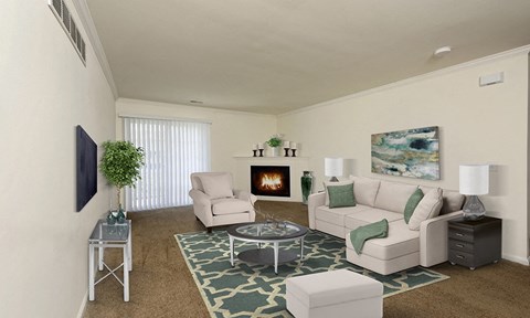 a living room with a couch and a chair and a fireplace