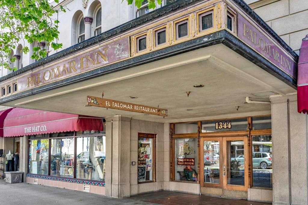 the front of a building with a sign that reads the restaurant