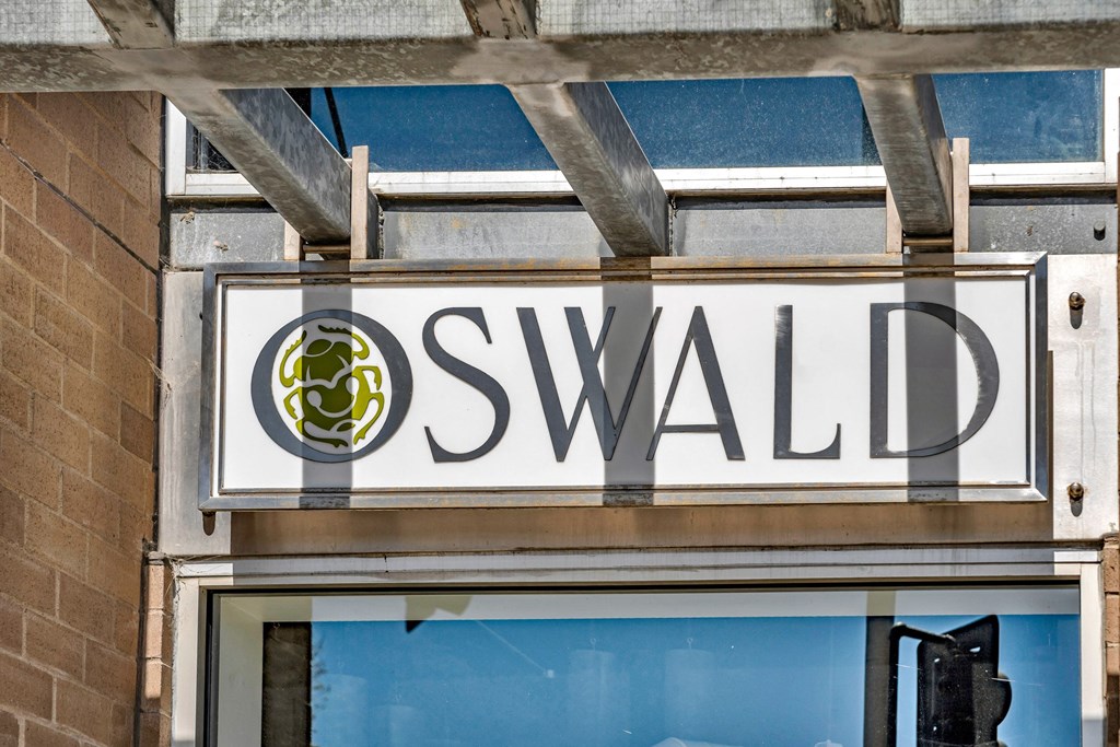 a sign for a swaledale sign on the side of a building