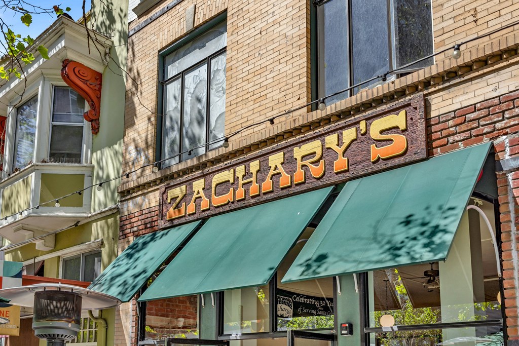 a sign on the side of a brick building