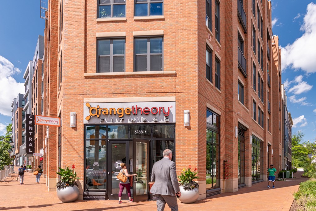 A red brick building with a sign that says