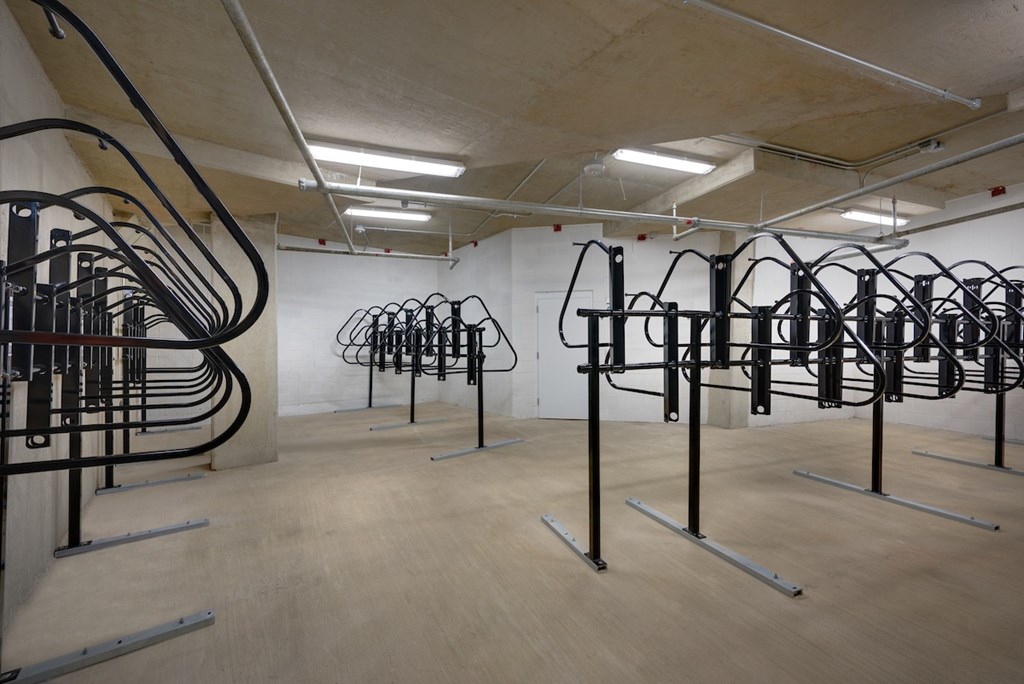 A gym with a variety of exercise equipment.
