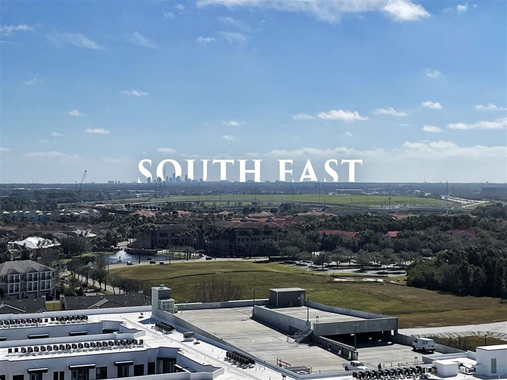 A large building complex with the words "SOUTH EAST" superimposed on the sky.
