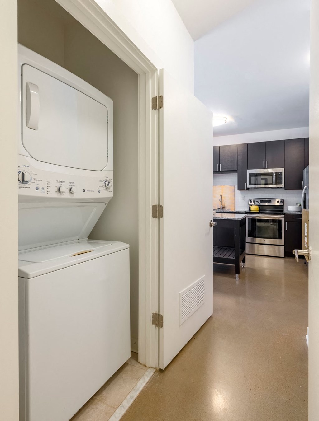 A white oven and dishwasher are in a kitchen.