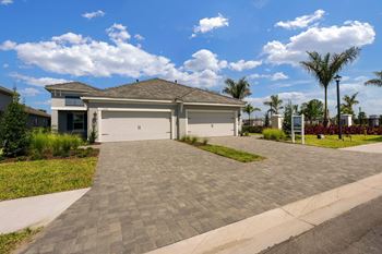 Attached two-car garages with private two-car driveways