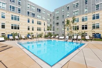 Resort Style Pool with Sundeck, Grills, and Fire Pits