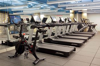 Fitness Center with cardio and weight training areas