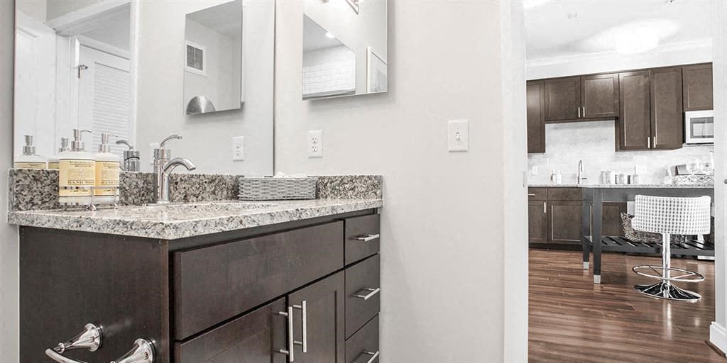 a kitchen with a sink and a counter top