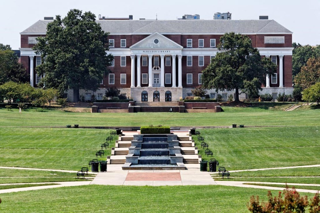 the steps leading up to a large building on the campus
