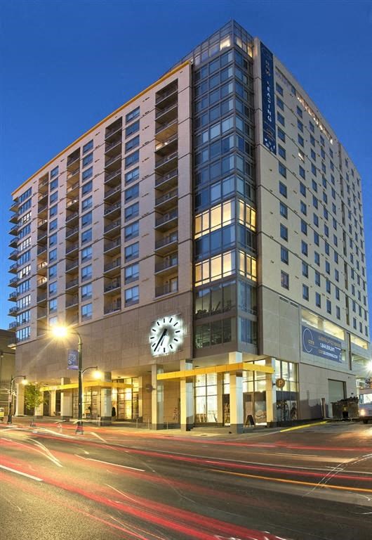 a tall building with a clock on the front of it